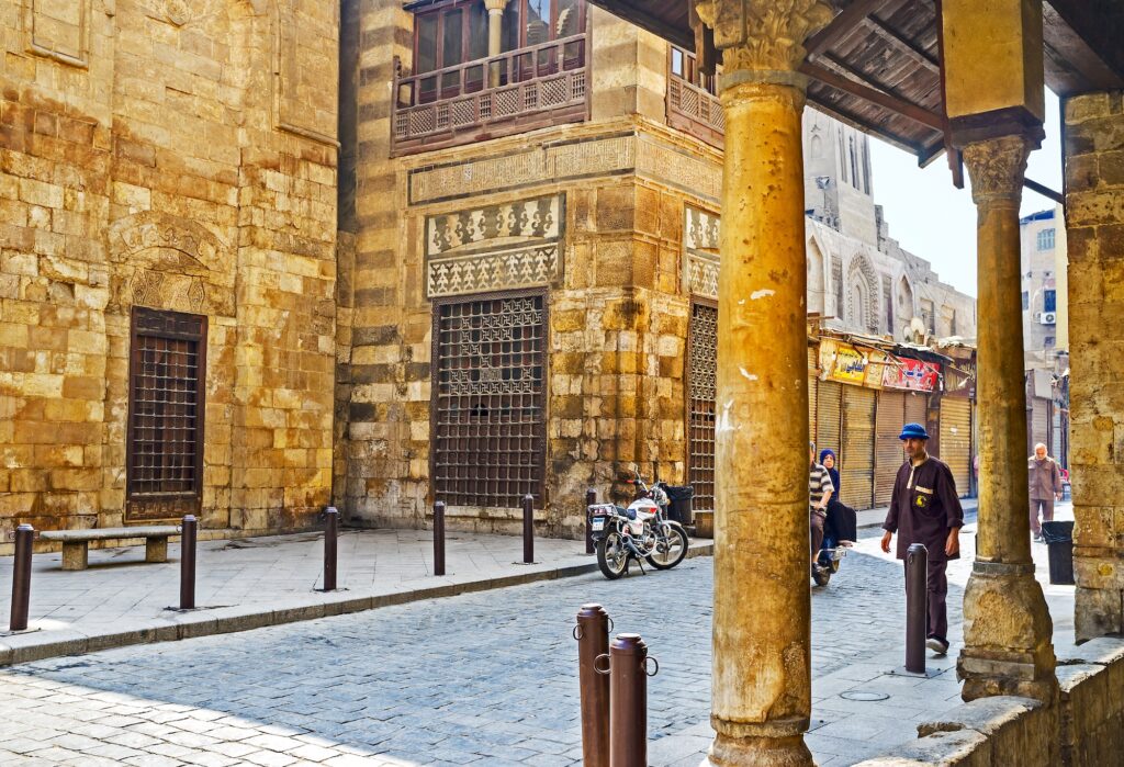 Stone walls of the Qalawun Complex lining Al-Muizz Street in Islamic Cairo, Qalawun Complex, Cairo