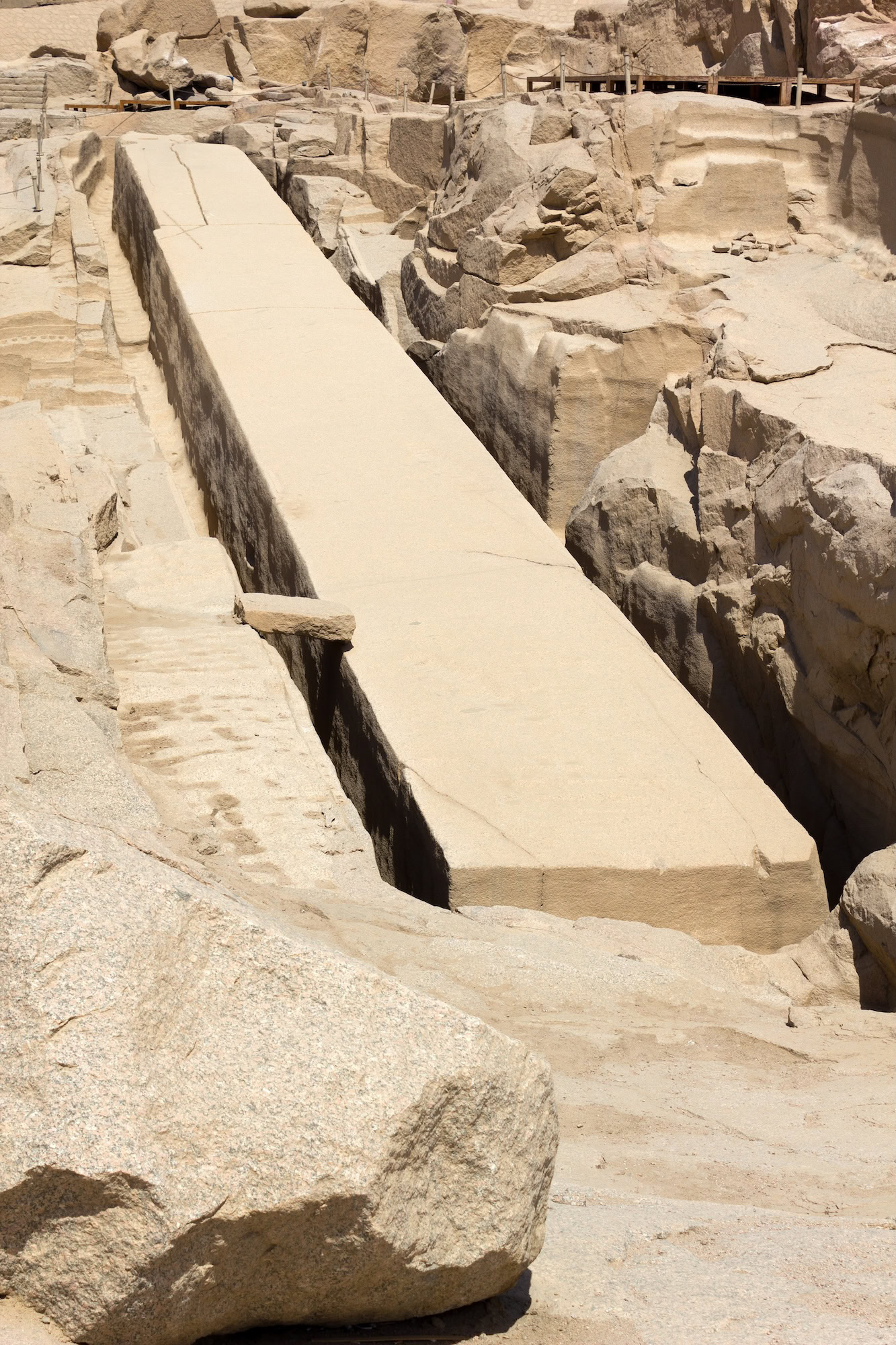 Ancient granite obelisk carved in stone quarry at Aswan archaeological site