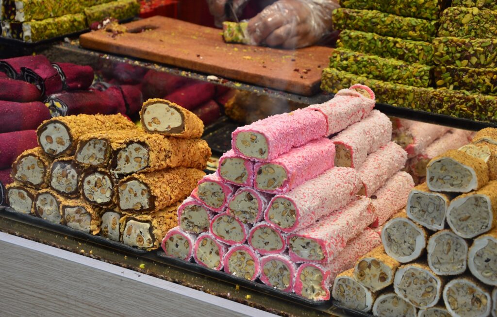Turkish delight stacked on a colorful market stall in Istanbul