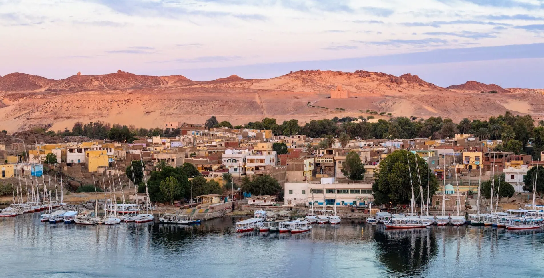 View of The River Nile and Nubian village on Elephantine Island Aswan Upper Egypt Egypt North Africa Africa 1905x976 crop 53 68