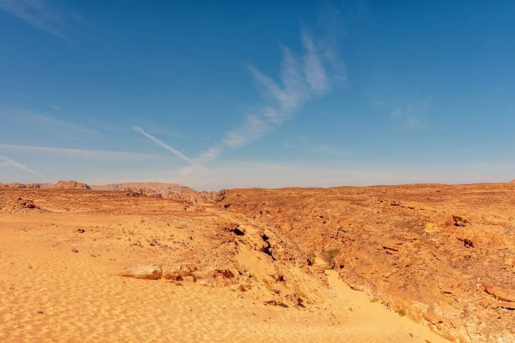 Mountain ranges rising across the arid Sinai Desert landscape