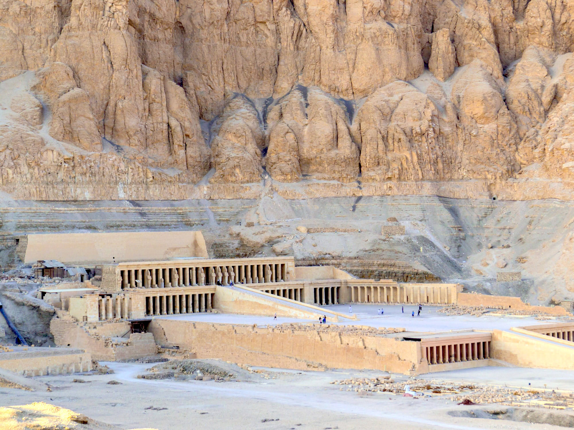 Ancient terraced Temple of Hatshepsut built into limestone cliffs at Deir el-Bahari, Luxor