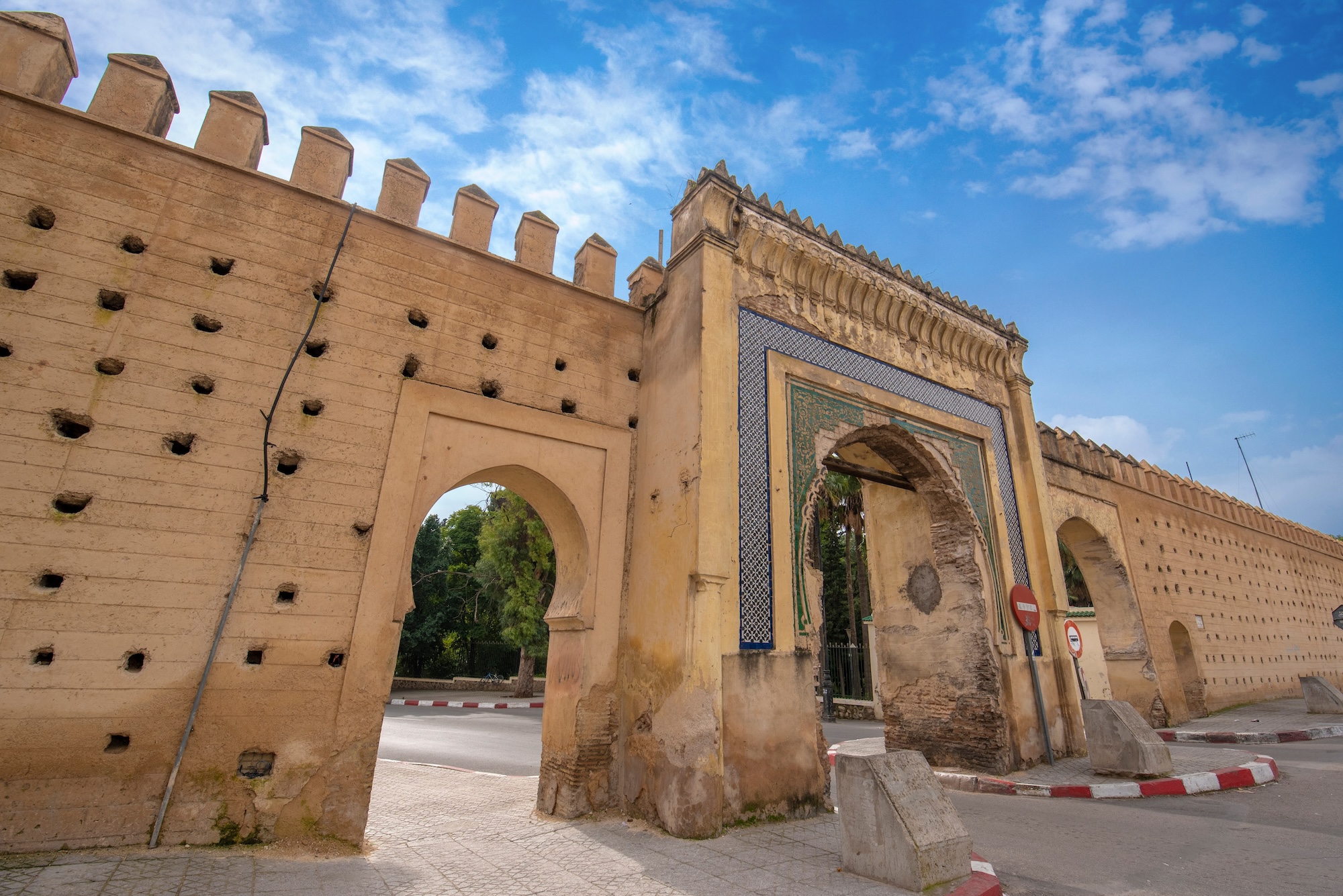 Historic ornate gate entrance to the old medina of Fez with traditional Moroccan architecture