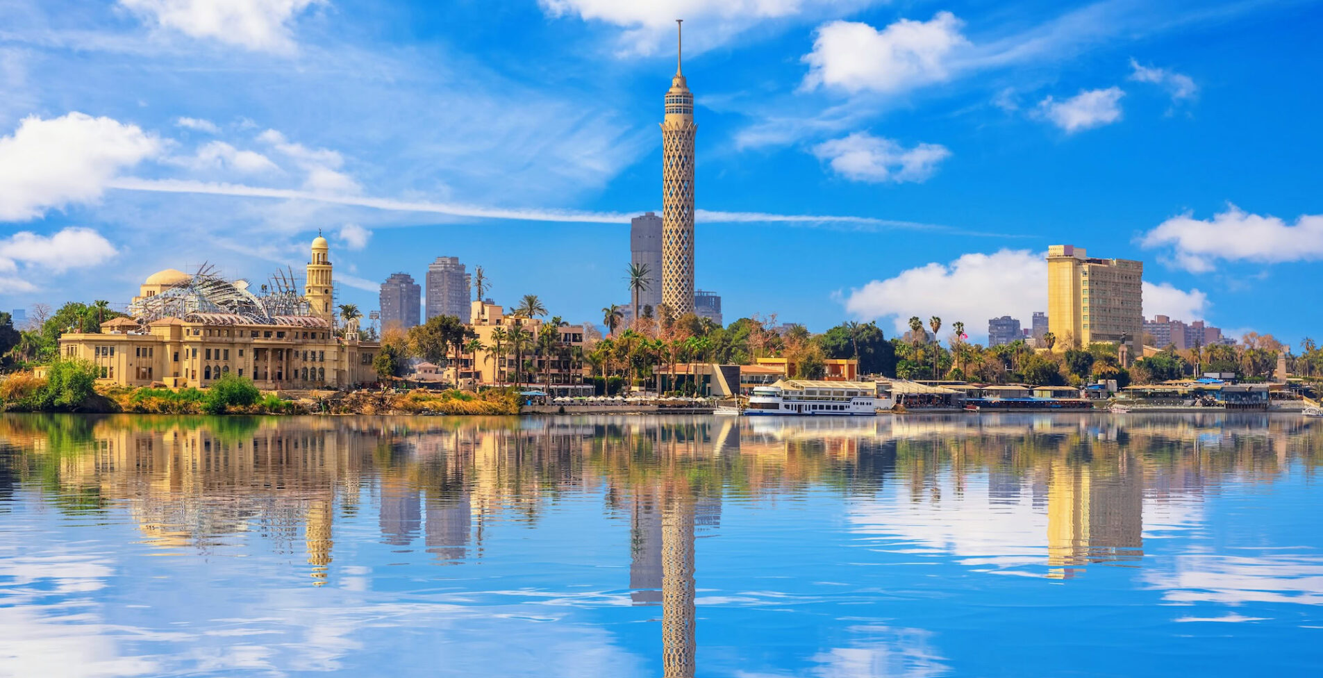 View on the Cairo Tower at cloudy day Gezira island in the Nile Egypt 1905x976 crop 50 32