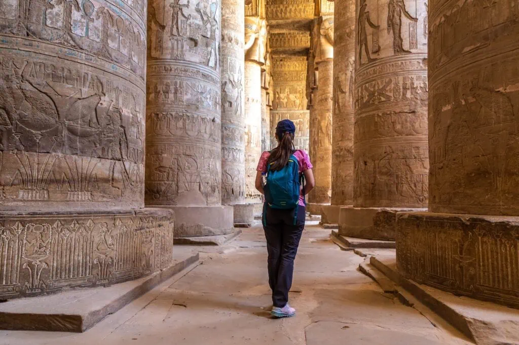 Female traveler visiting Dendera Temple near Luxor
