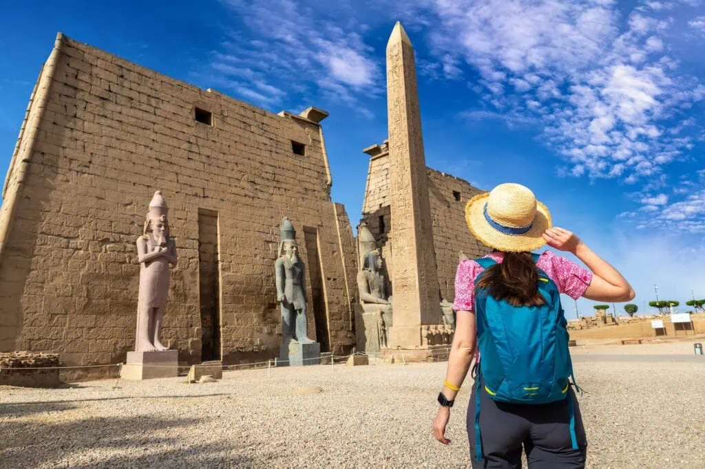 Woman tourist at Luxor Temple in a sunny day Luxor Egypt