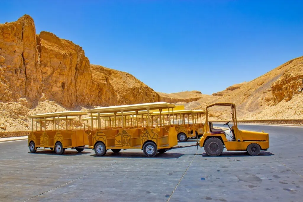 Tourist vehicle driving through the Valley of the Kings in Luxor, Egypt – a common sight on Egypt tours from Washington DC.