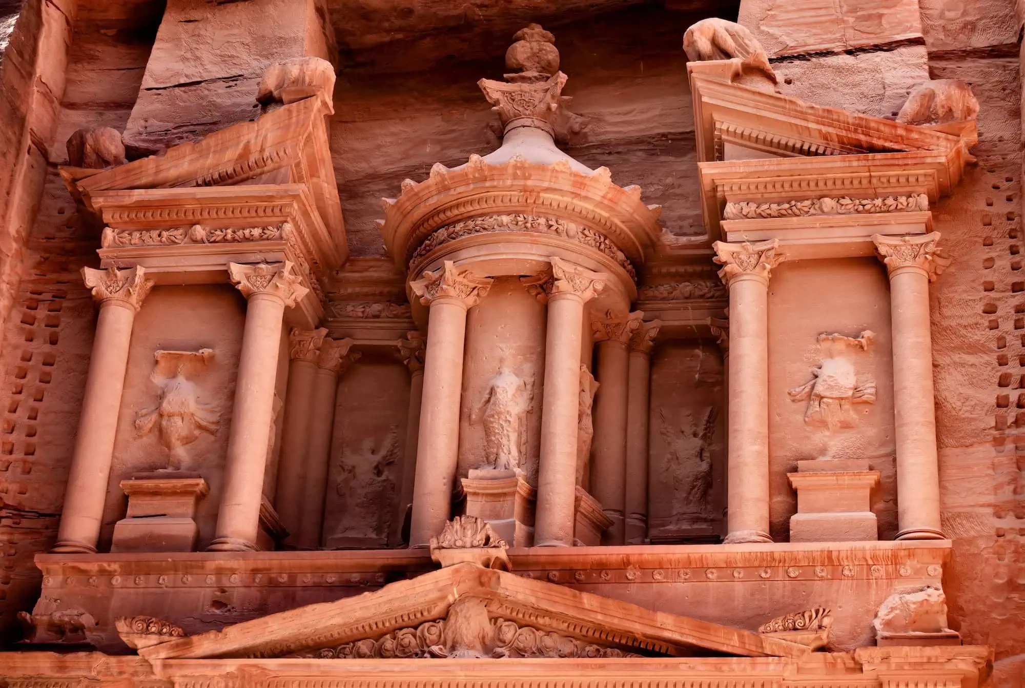 Detailed view of Treasury facade carved columns and Nabataean architecture in Petra