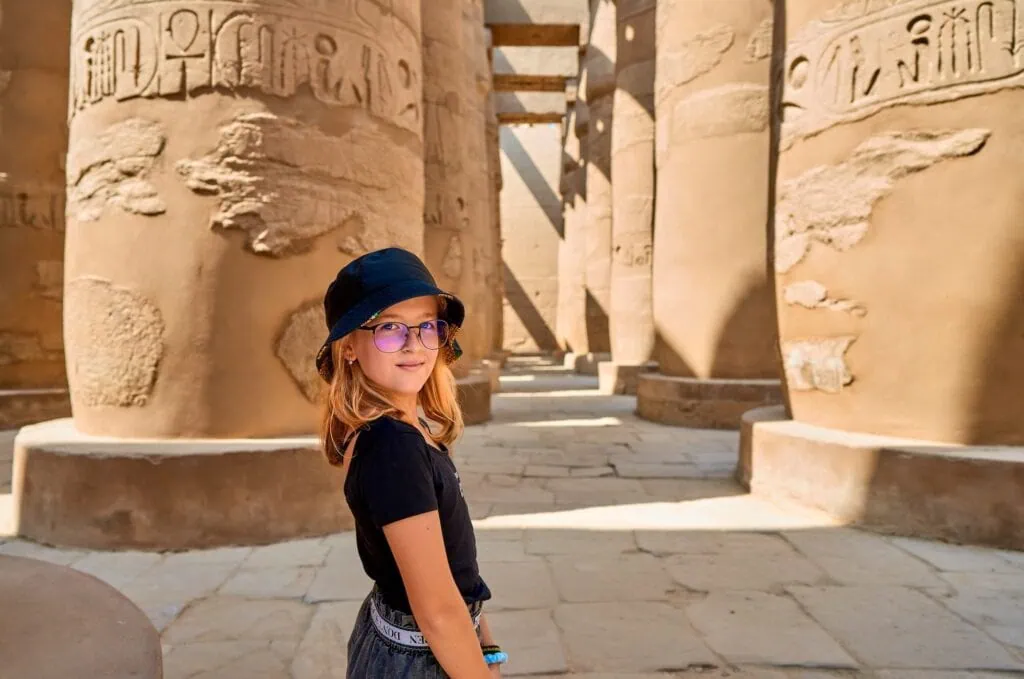 Girl among the columns of Karnak Temple, Luxor