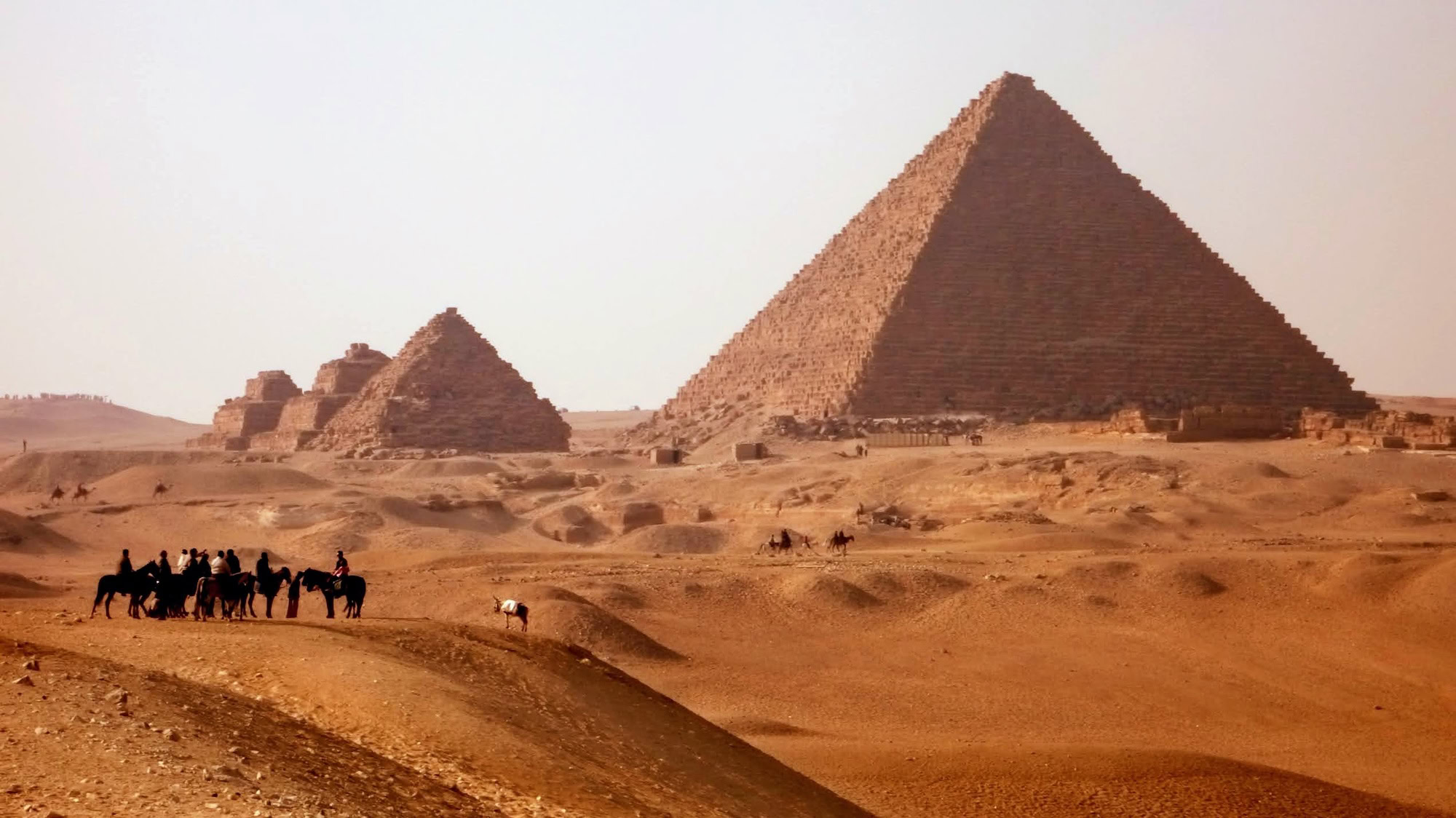 Tourists visiting the Pyramids of Giza