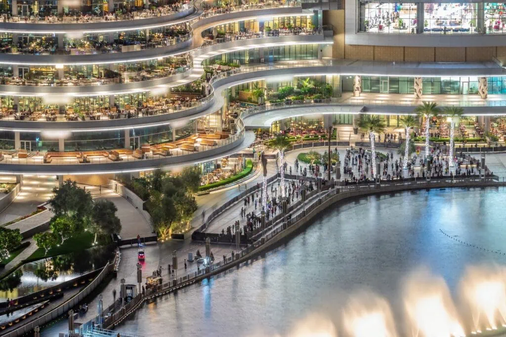 Dubai Mall fountain promenade and restaurant terraces at night, Dubai