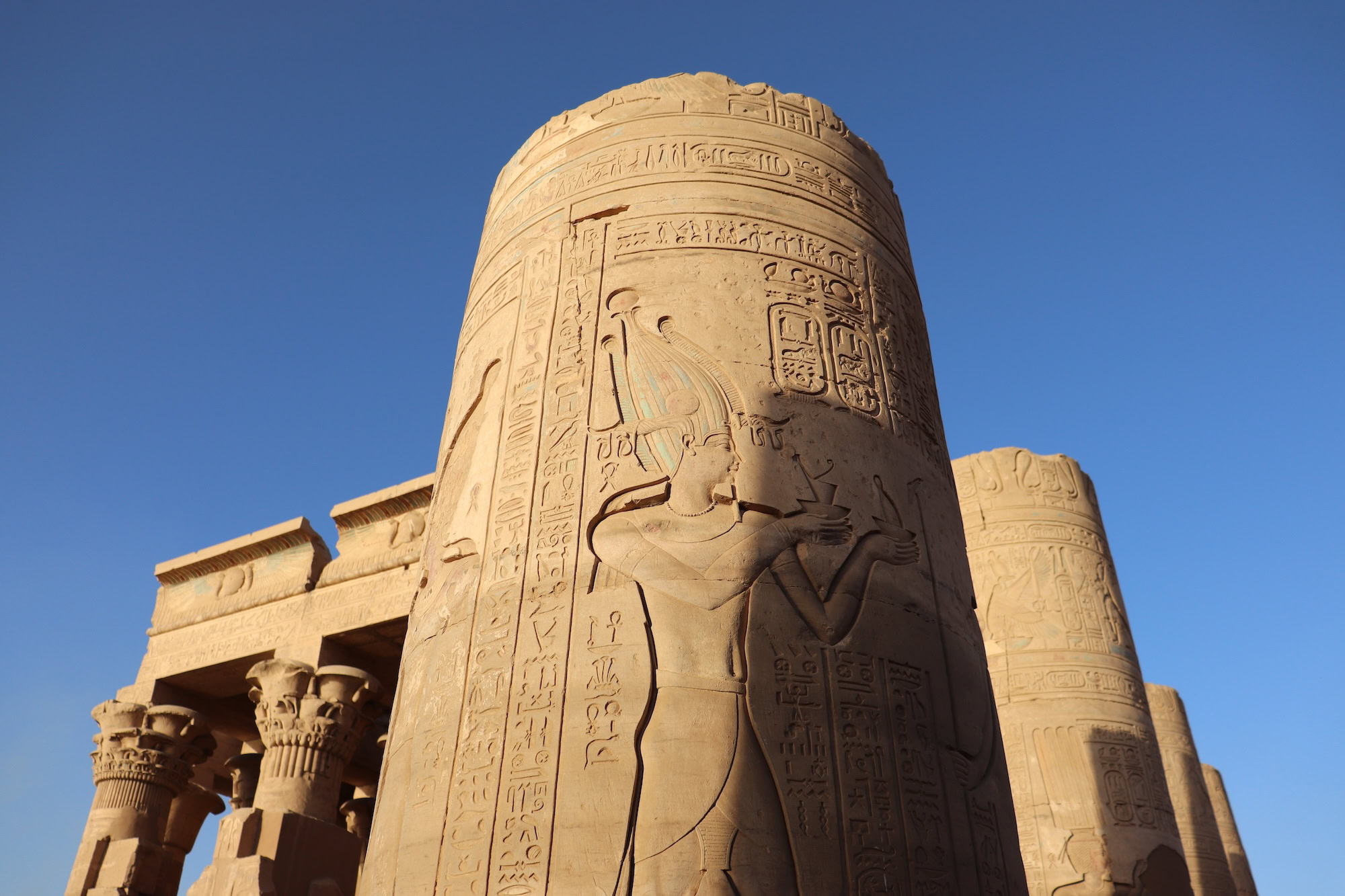 Pharaoh offering to the gods — carved in stone at Kom Ombo Temple