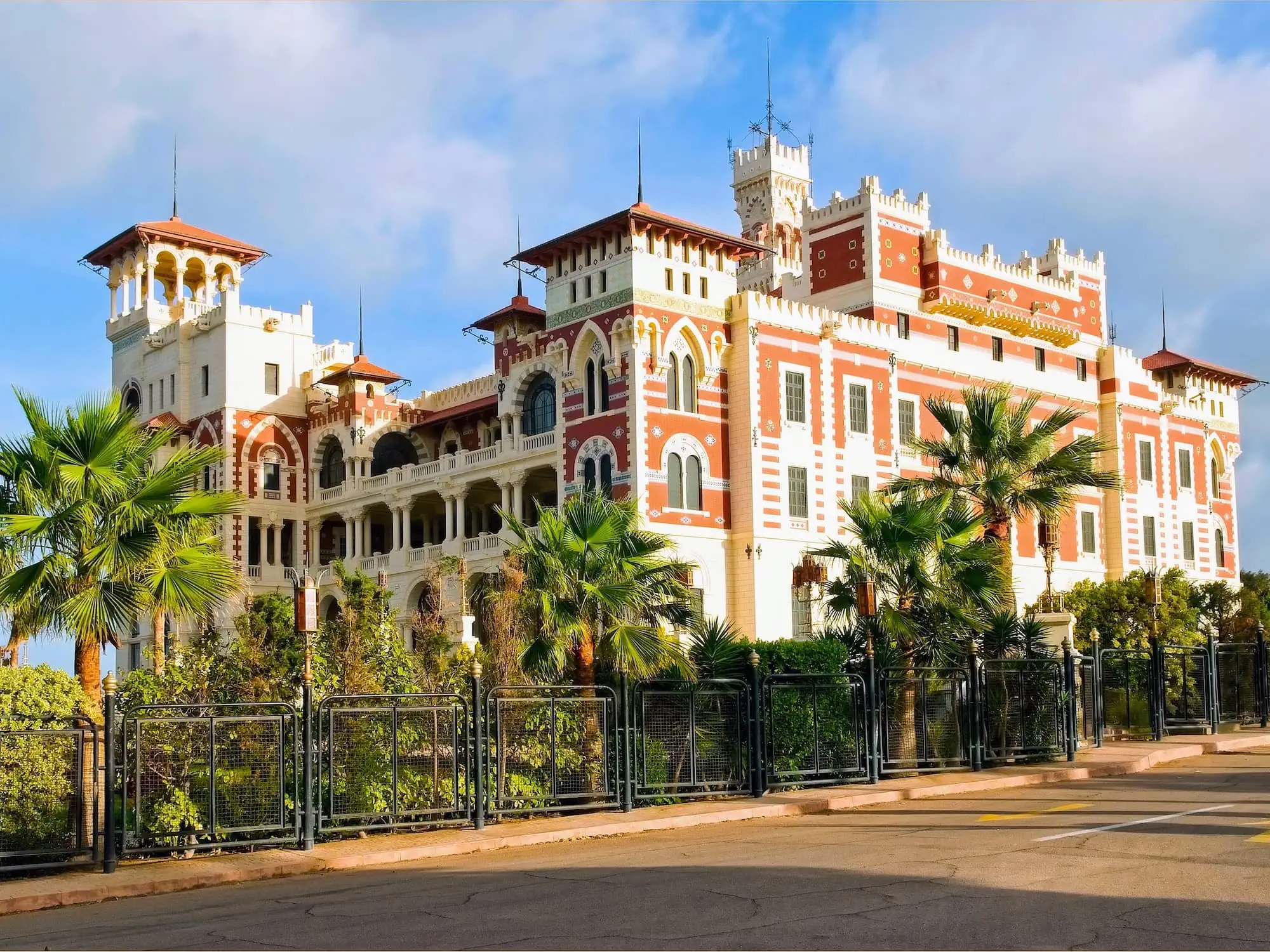 Montaza Palace with towers and palm trees overlooking the Mediterranean Sea in Alexandria