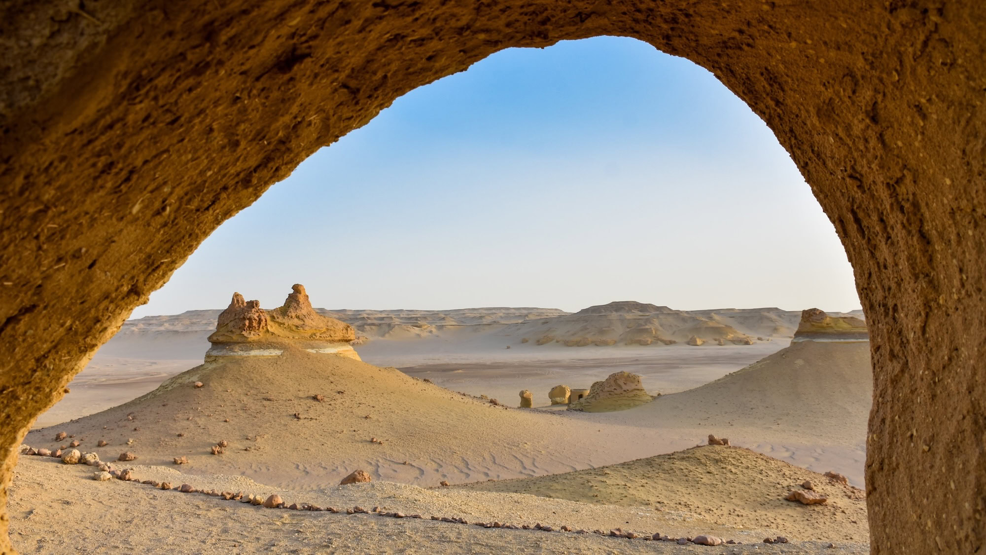 Desert landscape of Valley of the Whales showing rocky formations and sandstone cliffs