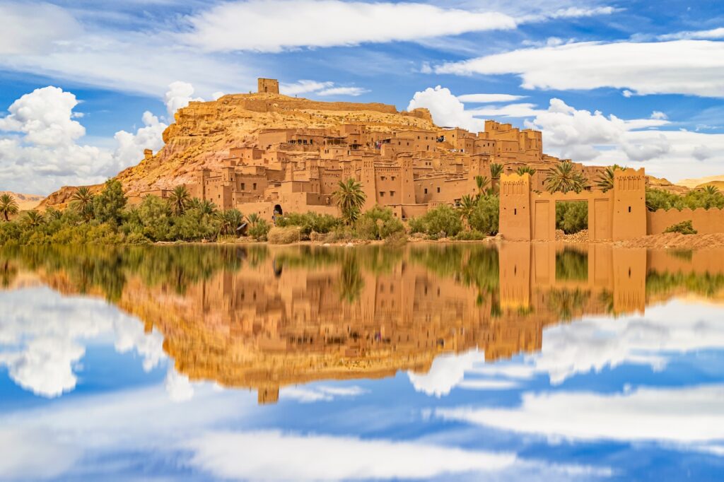 Berber villages nestled in the Atlas Mountains with rugged peaks behind