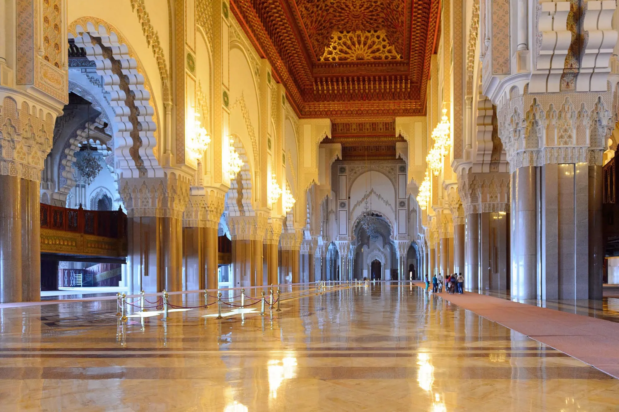 Interior view of Hassan II Mosque showing ornate Islamic architecture and prayer hall