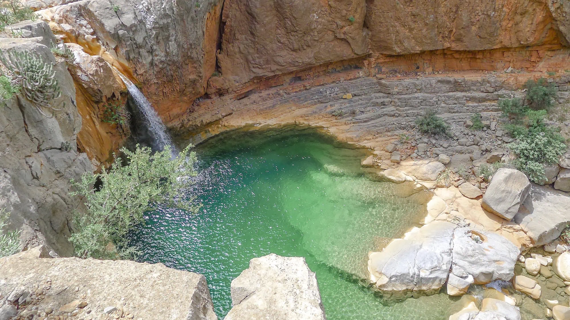 Natural swimming pool with waterfall in Paradise Valley, Morocco