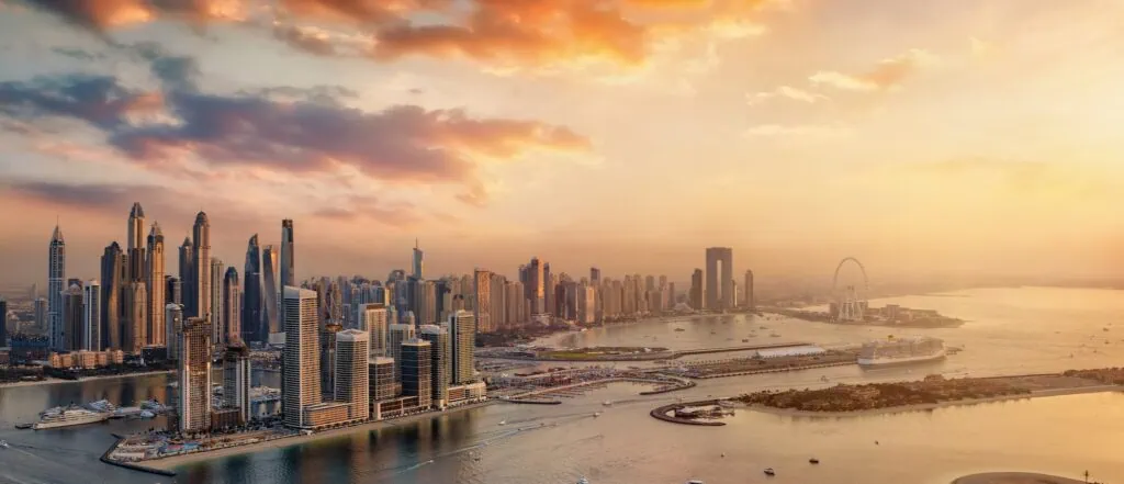 The high-rise skyline of Dubai Marina at sunset in the United Arab Emirates, a popular add-on destination paired with Egypt on multi-country tours.