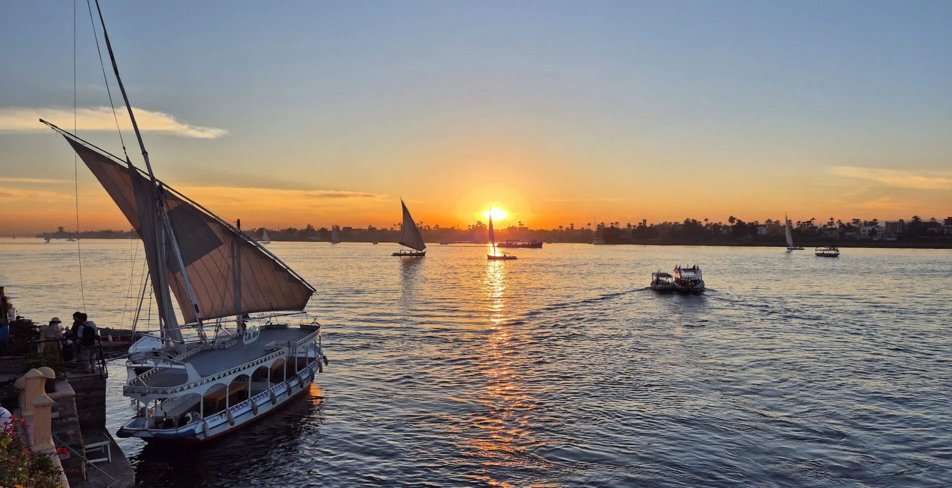 Beautiful sunset over the River Nile in Luxor Egypt 1905x976 crop 45 49