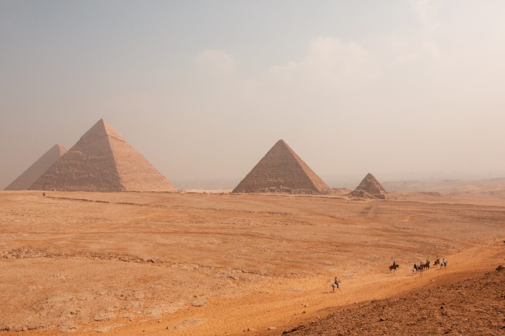 The iconic Pyramids of Giza rising above the desert—one of the world’s great wonders.