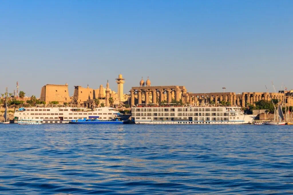 Promenade showing Luxor Temple and cruise liners, Luxor