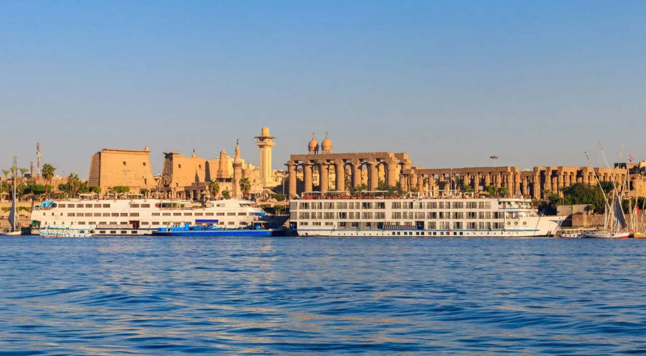 Promenade showing Luxor Temple and cruise liners, Luxor