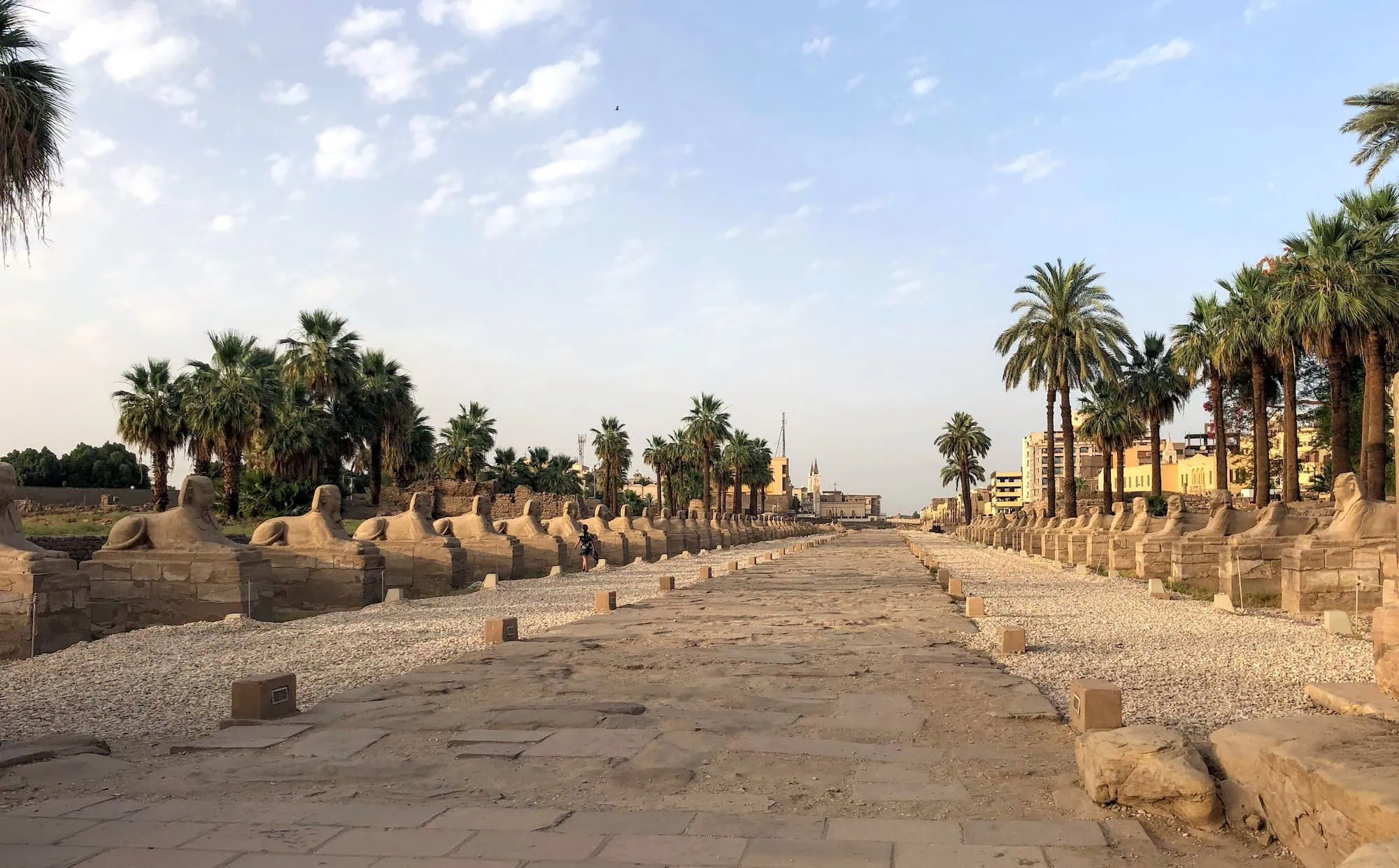 Ancient Avenue of Sphinxes pathway connecting Karnak and Luxor temples in Egypt