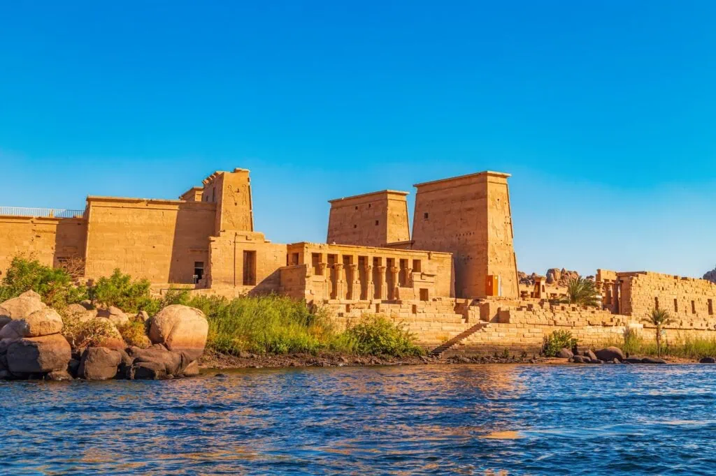 The Ptolemaic-era Temple of Isis at Philae, on Agilkia Island in Aswan, Egypt — Greek-Egyptian fusion architecture relocated stone by stone in the 1970s after the construction of the Aswan High Dam, UNESCO World Heritage Site