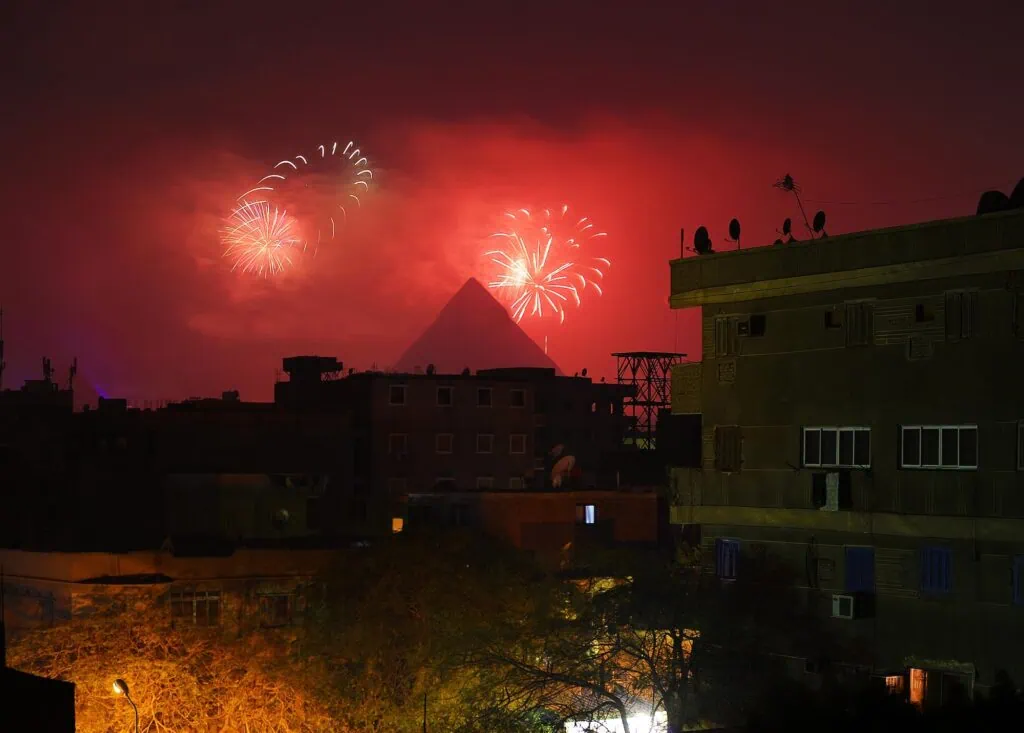 Fireworks and light displays over the pyramids during New Year's celebrations, Giza - Egypt New Year Tours