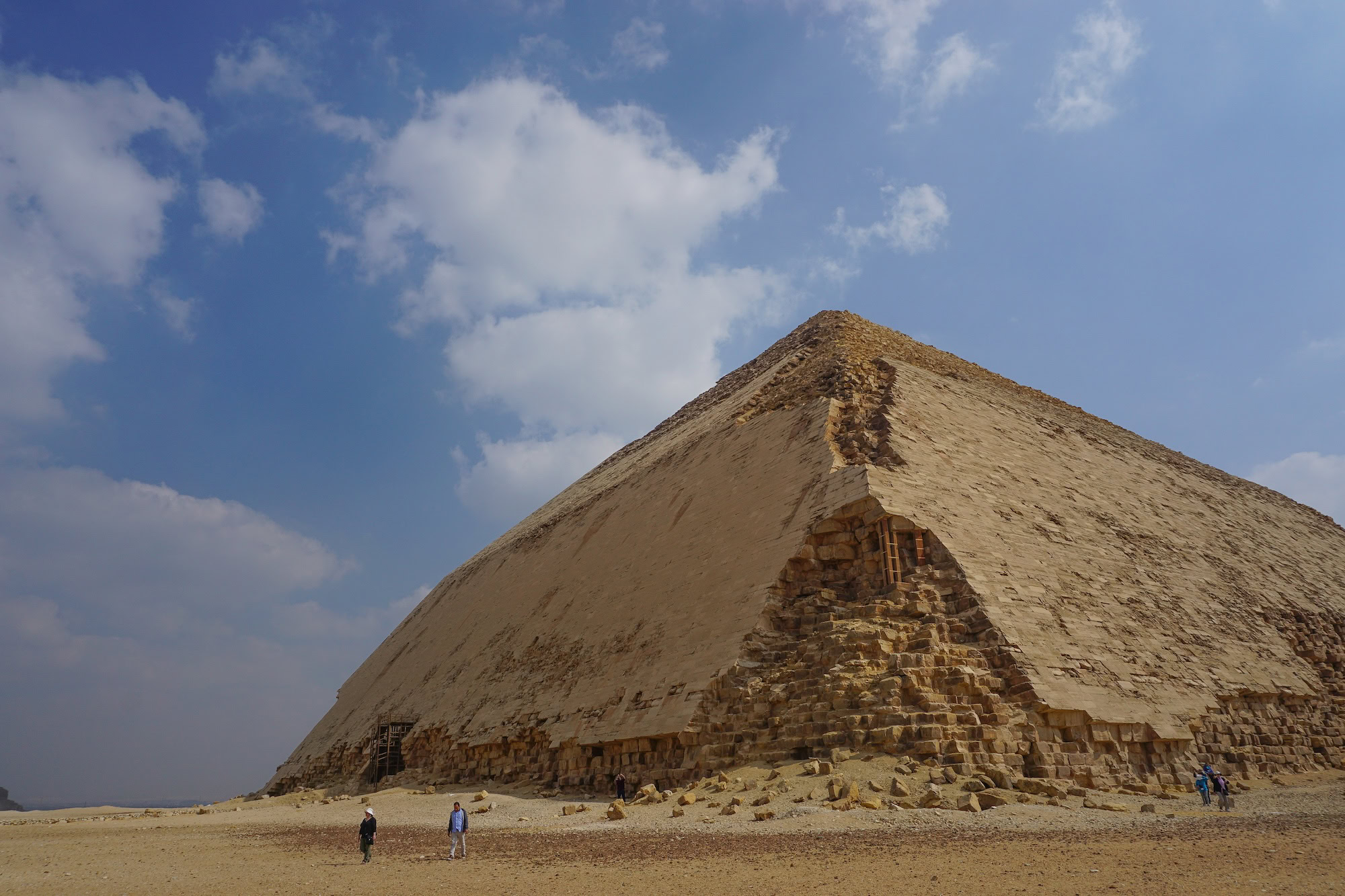The Bent Pyramid at Dahshur showing detailed limestone block construction against desert landscape