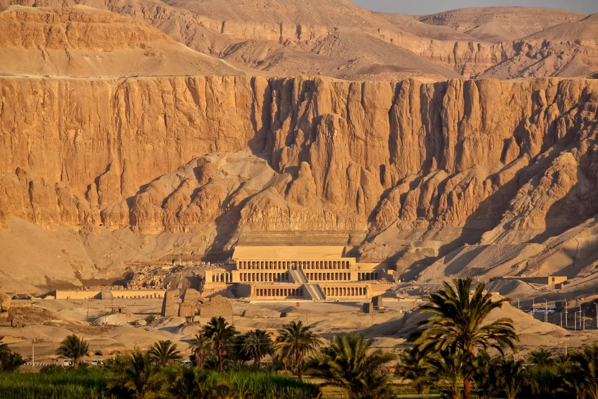 Aerial view of Temple of Hatshepsut with terraced architecture against limestone cliffs