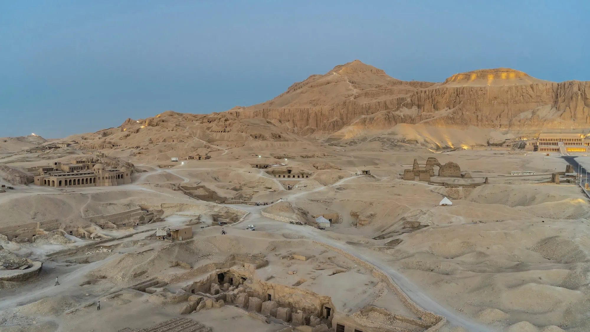 Valley of the Kings archaeological site with ancient temples and desert cliffs in Luxor