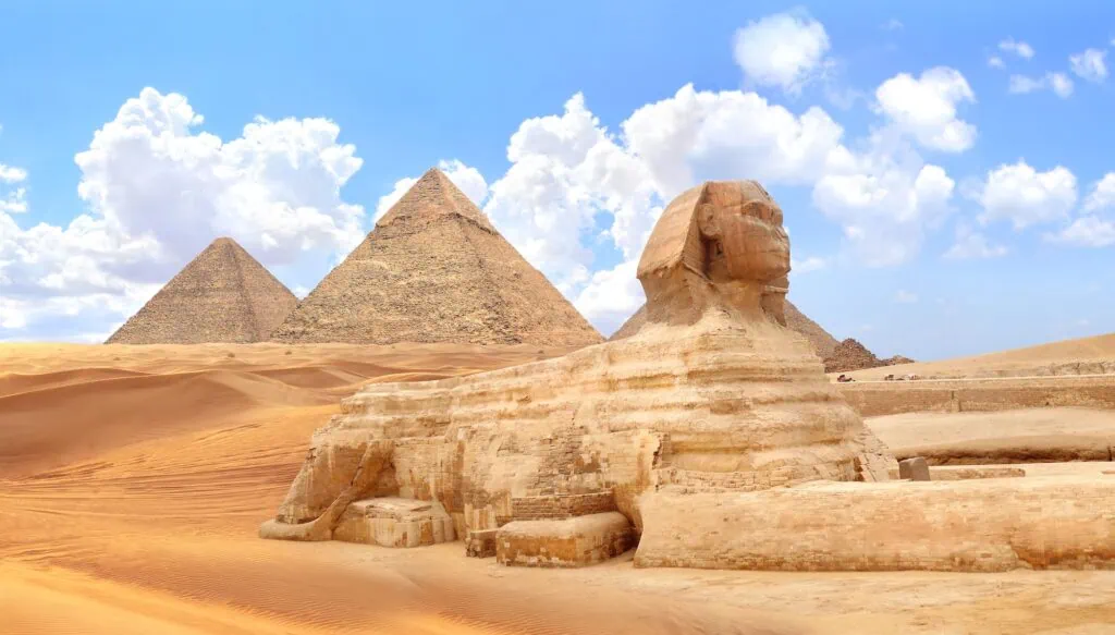 Great Sphinx with the Pyramids of Cheops and Chephren at the Giza Plateau, Giza