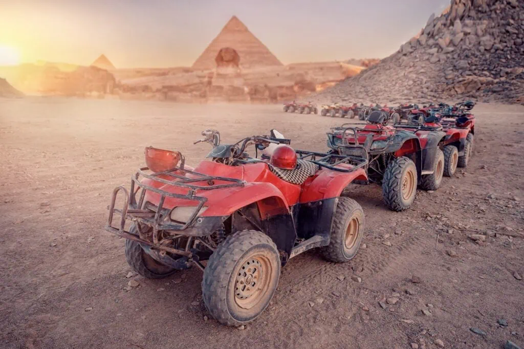Quad bikes lined up before the Giza Pyramids