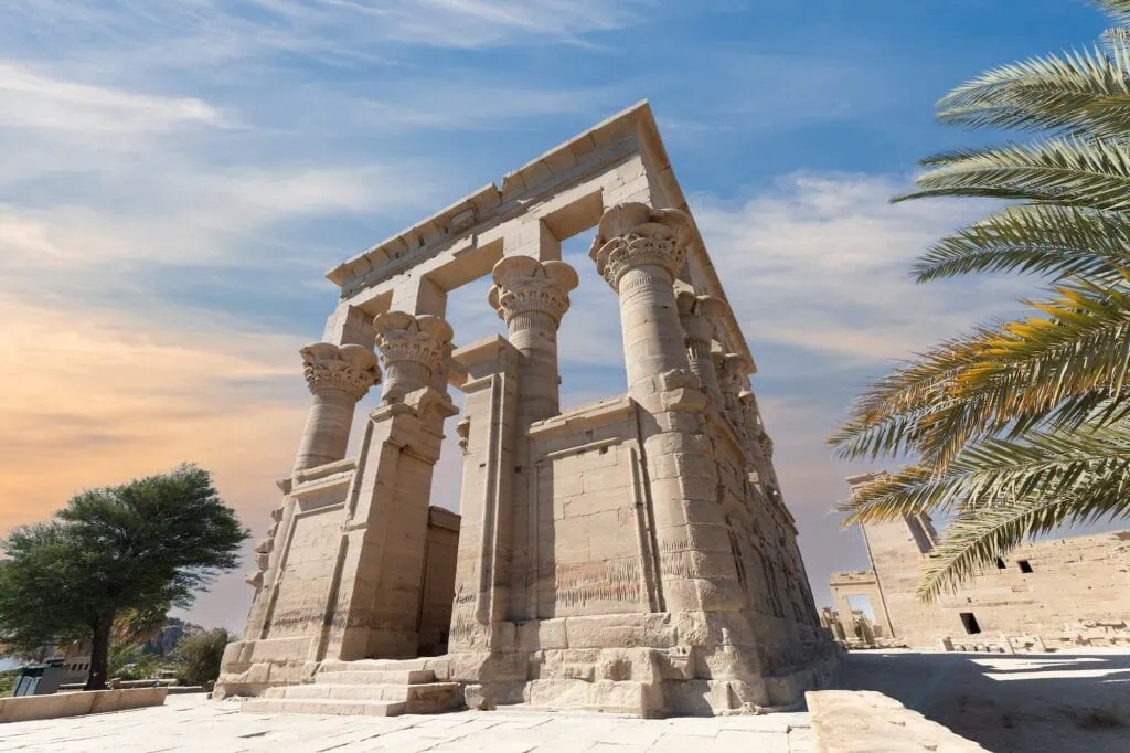Trajan's Kiosk on Agilkia Island at Philae near Aswan, Egypt, a Roman-era pavilion in pharaonic style beside the Nile.