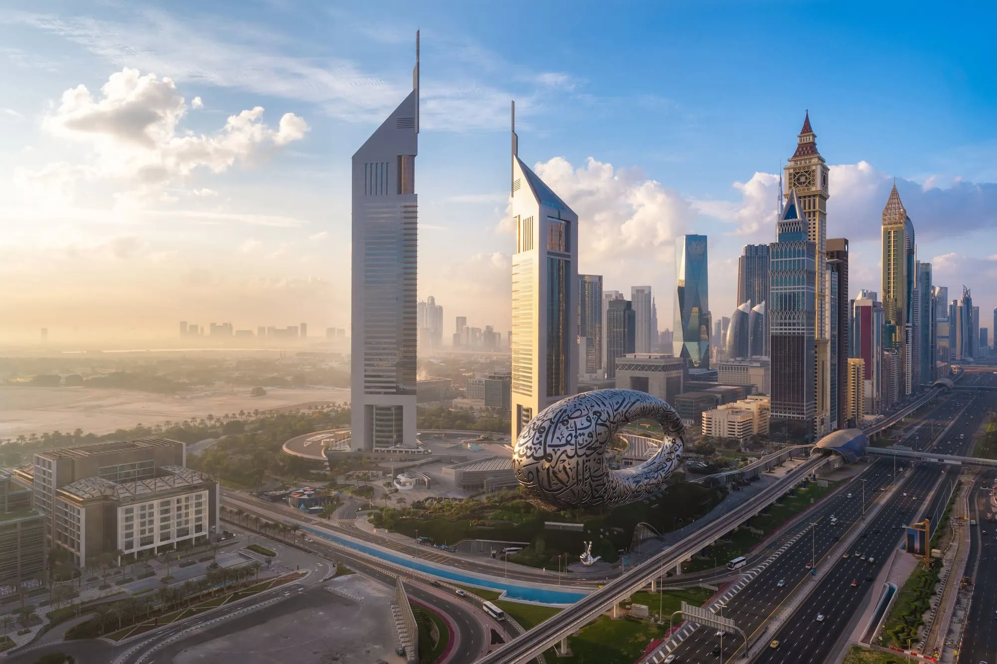 Aerial view of Dubai's ultra-modern skyline featuring the futuristic Museum of the Future