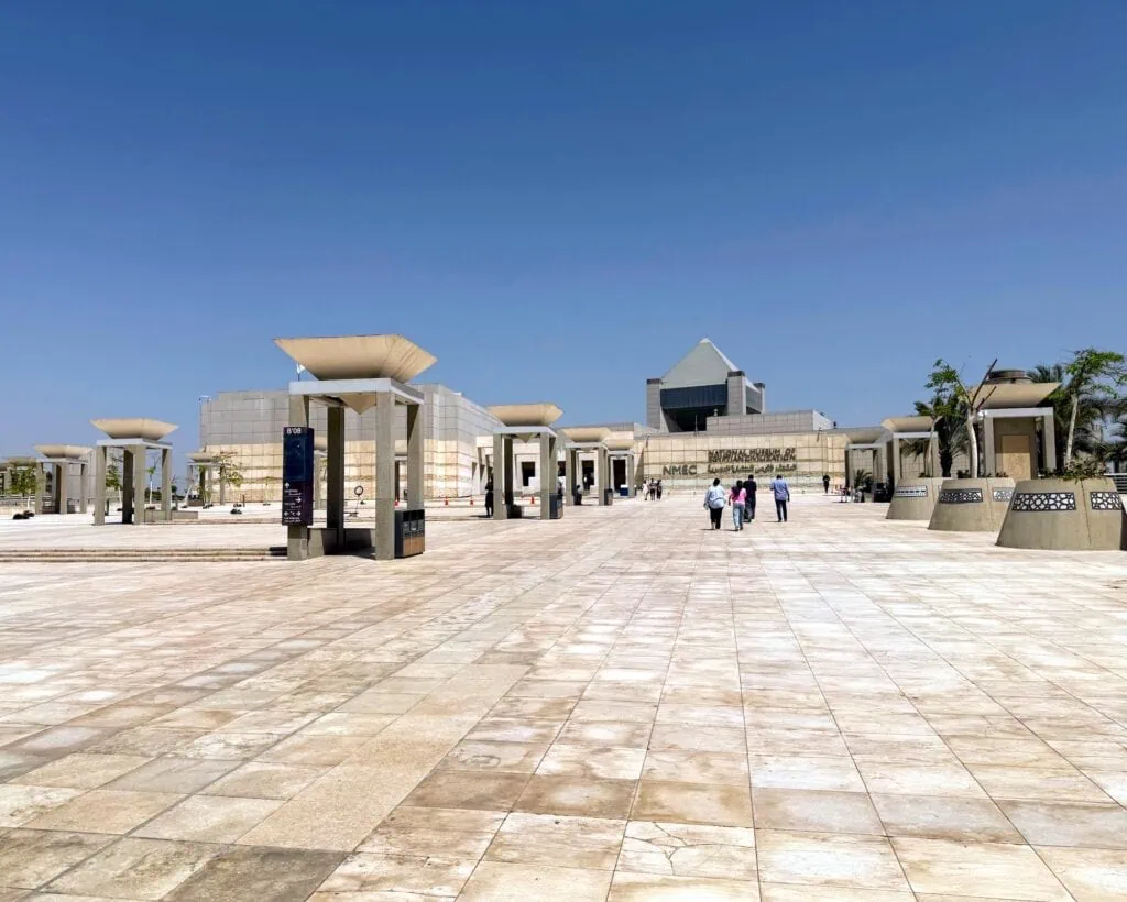 The modern facade and main entrance of the National Museum of Egyptian Civilization in the Fustat district of Cairo