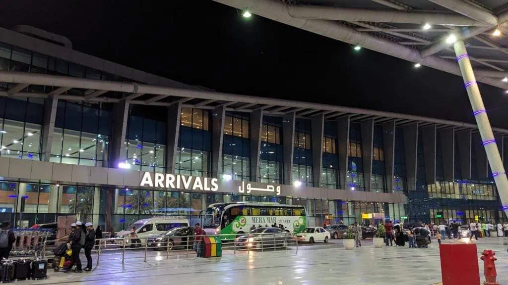 Arrivals Hall of Terminal 2 at Cairo International Airport with bilingual Arabic and English signage above the immigration counters