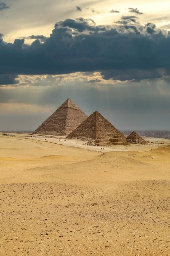 The Great Pyramids rising above the desert plateau at the Giza Pyramids, Giza