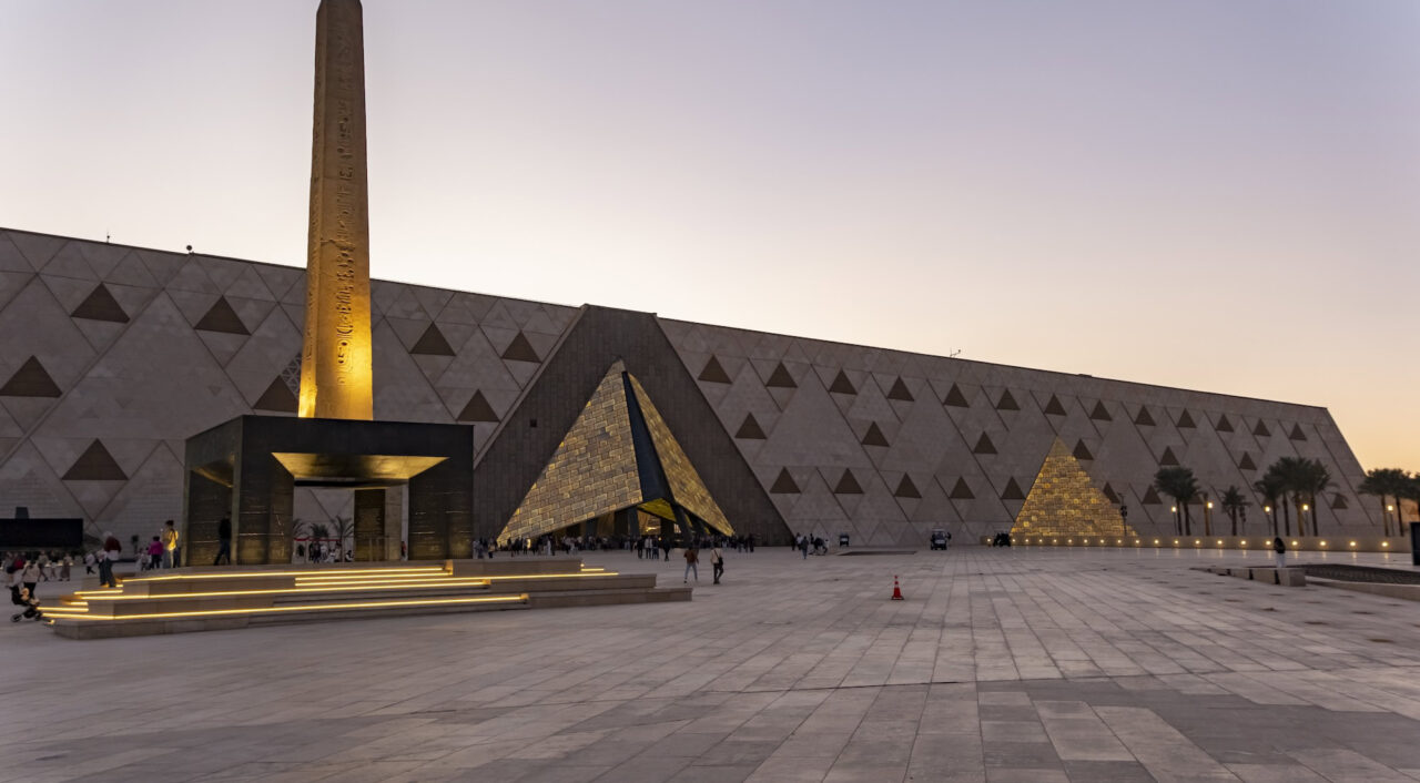Exterior entrance with the main facade and forecourt of the Grand Egyptian Museum, Giza