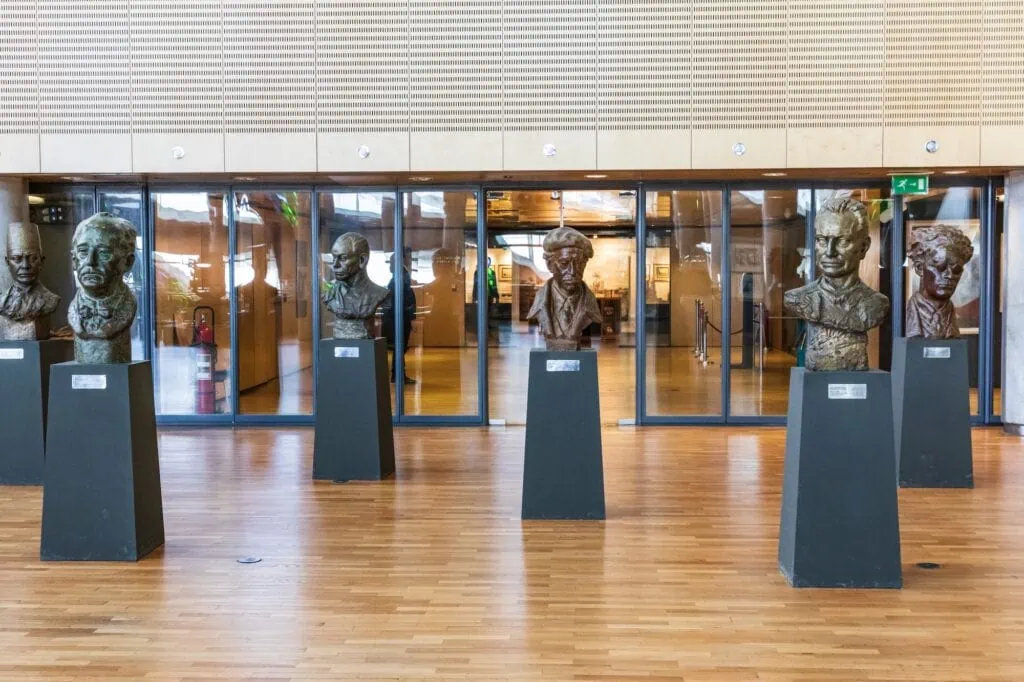 Stone bust sculptures displayed within the interior spaces of the Bibliotheca Alexandrina, Alexandria