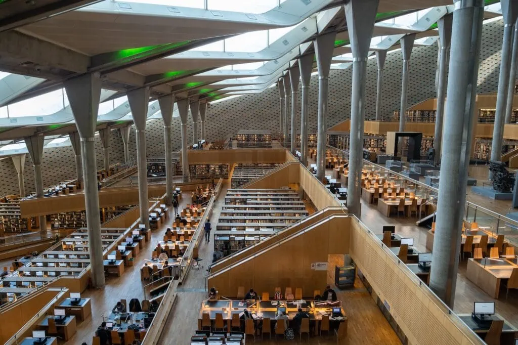 Interior view of the Bibliotheca Alexandrina with reading halls, terraces, and natural light, Alexandria