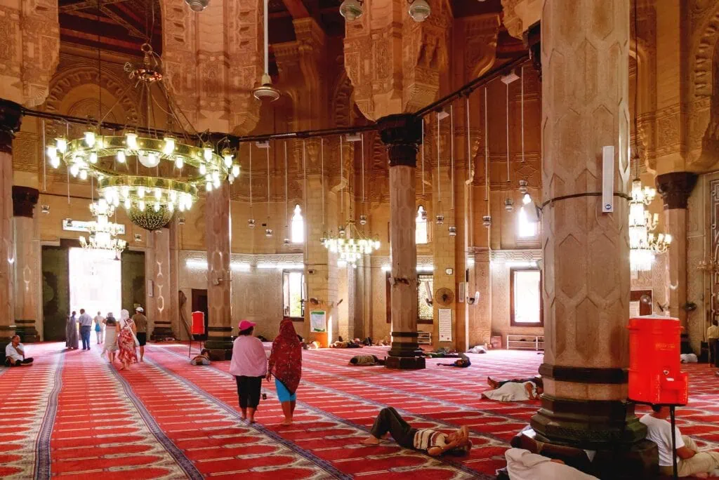 Interior of Abu al-Abbas al-Mursi Mosque showing prayer hall, columns, chandeliers, and Islamic decorative details, Alexandria