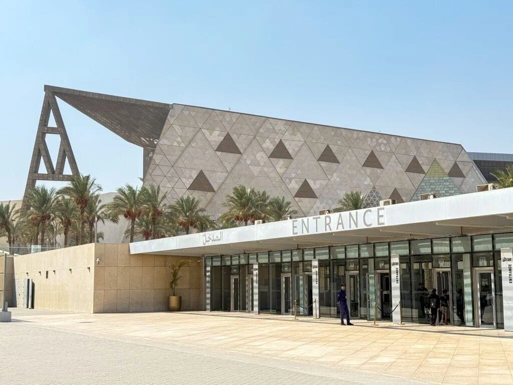 Entrance of the Grand Egyptian Museum with modern geometric facade