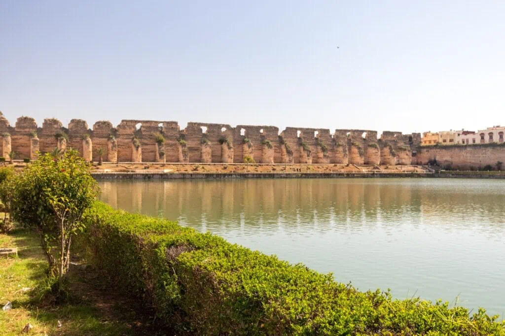 Heri es-Souani granaries and Agdal Basin reservoir with stone walls and water surface, Meknes