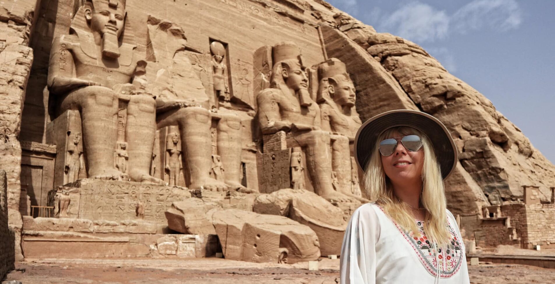 woman as a tourist in front of the temple of Abu Simbel in Egypt